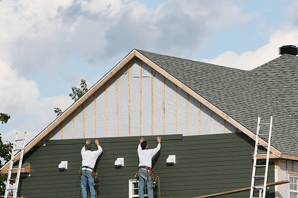 Professional Siding Installation technician working in Boonville, NC